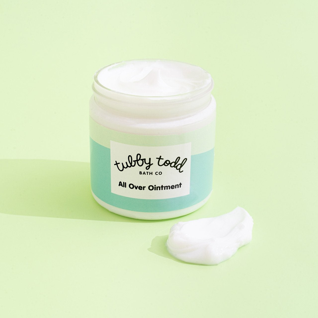 3.5 oz Tubby Todd All Over Ointment green background